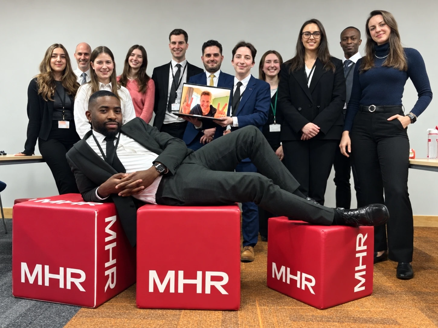 The MHR team together in the office